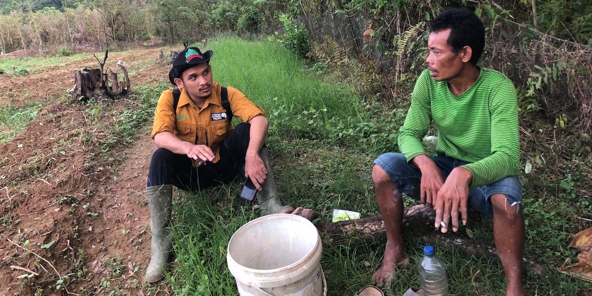 SHL Ranger socialising with farmer in Leuser Ecosystem